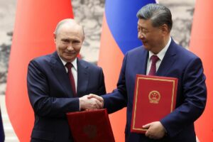 Président russe en Chine : Xi et Poutine soulignent leur amitié à Pékin